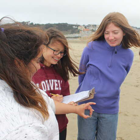 Students explore nature and engage with citizen science during an outdoor bioblitz.