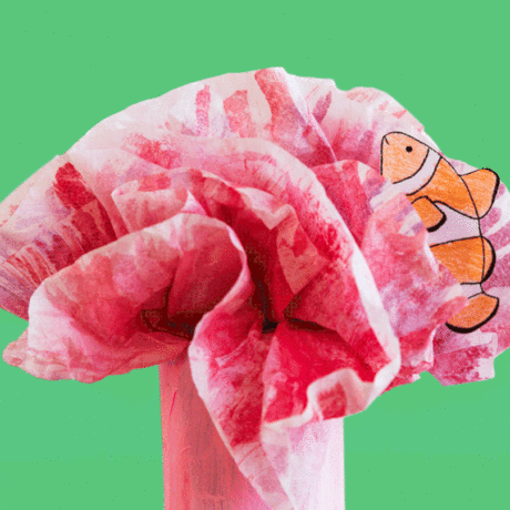 Animated GIF of paper clownfish swimming through paper anemone