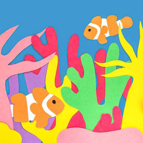 A scene of the coral reef with anemone fish, made with colorful construction paper.