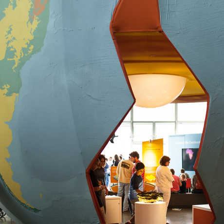 A giant recreation of our planet allows visitors to wander inside and explore the core.