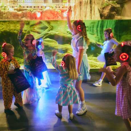 Image of kids in the silent disco in Steinhart Aquarium