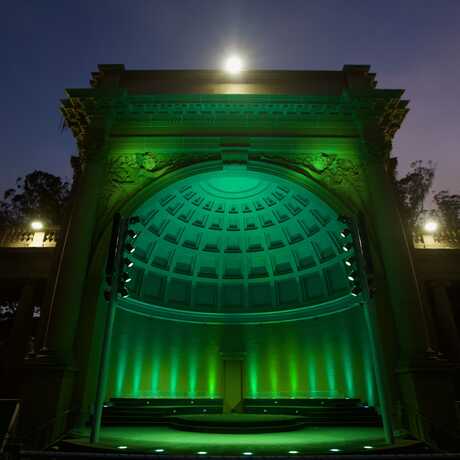 Music Concourse bandshell in Golden Gate Park illuminated by green light