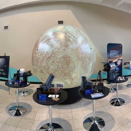 Inflatable model of Europa, moon of Jupiter, part of NASAs Europa Clipper exhibit