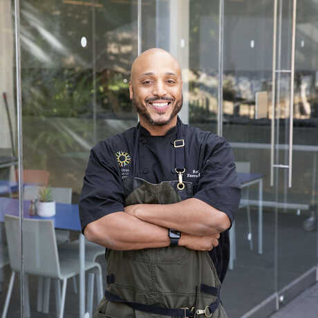 Portrait of Academy Executive Chef Rob Lilly in front of Terrace Restaurant