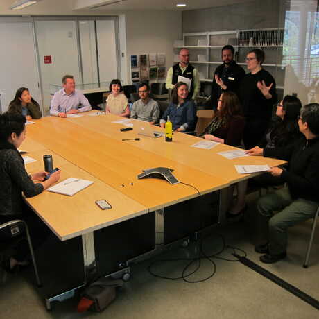 A Staff Advisory Council meeting in an Academy board room