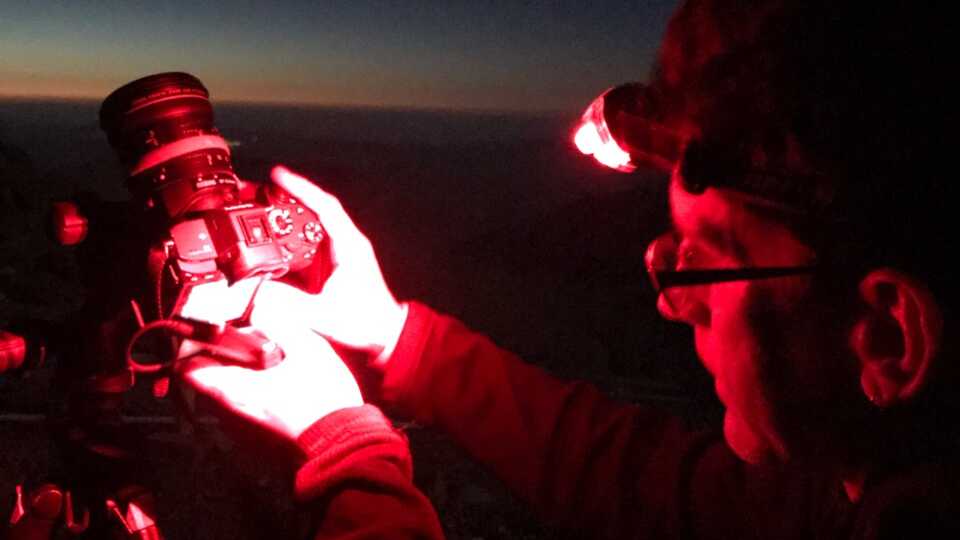 Matt Blackwell sets up camera for night shoot.