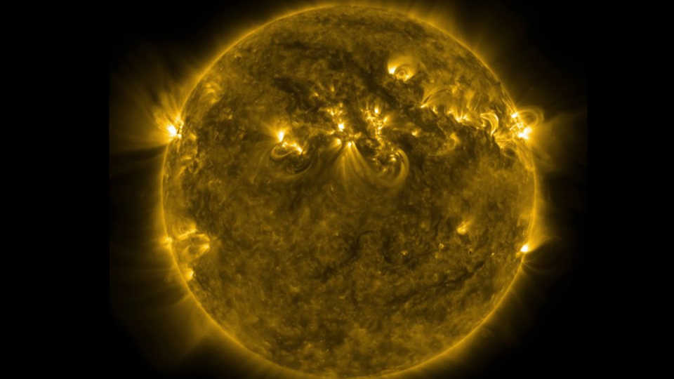 A striking photograph of the sun reveals gigantic solar flares